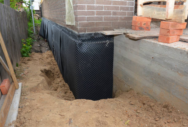 SJ Waterproofing Pros technician performing targeted Interior Drainage System assessment in Colton, OH